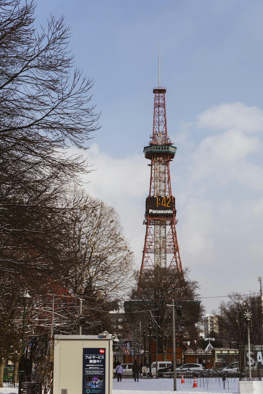 a tall tower with a clock on top of it