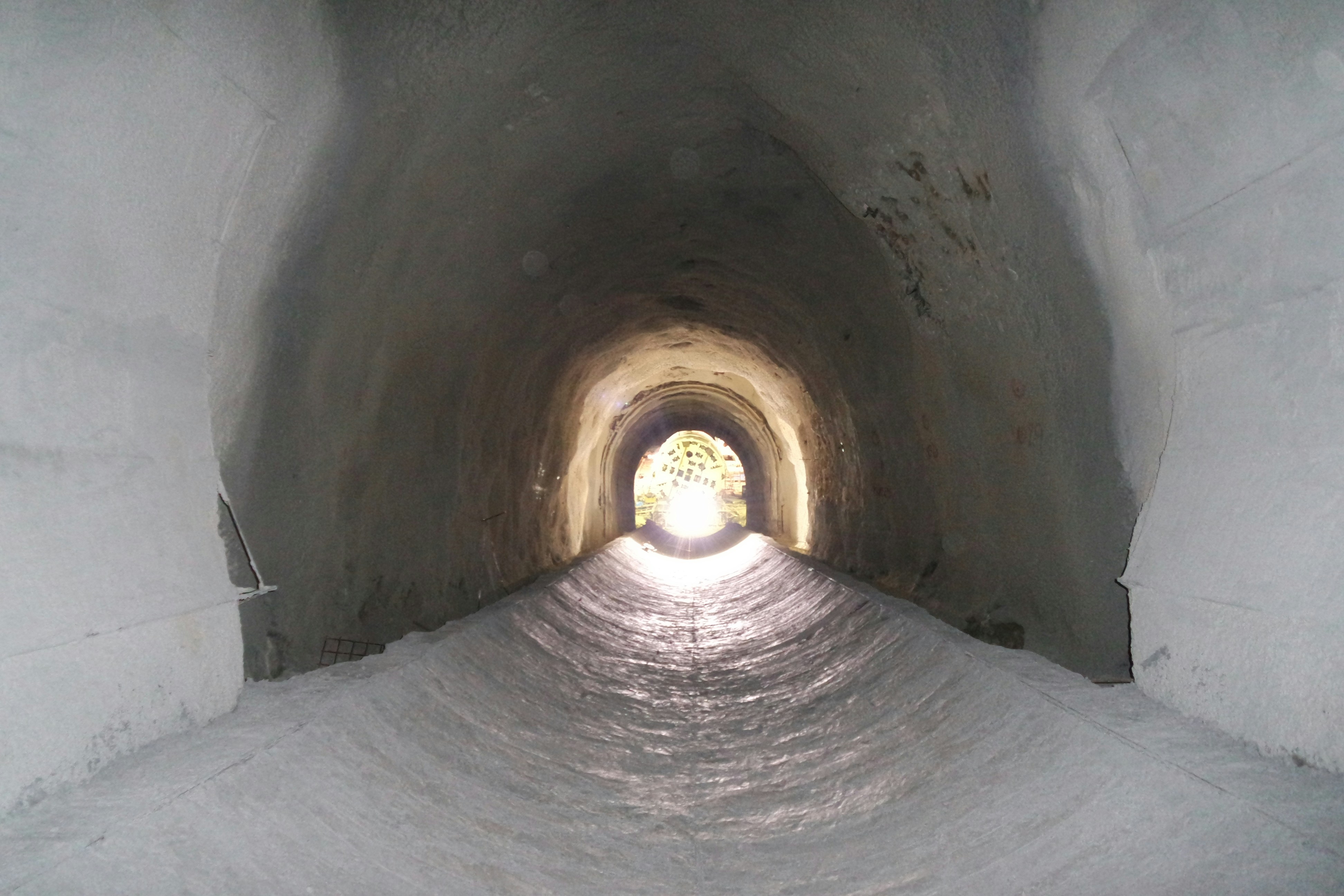 a tunnel with a light at the end of it
