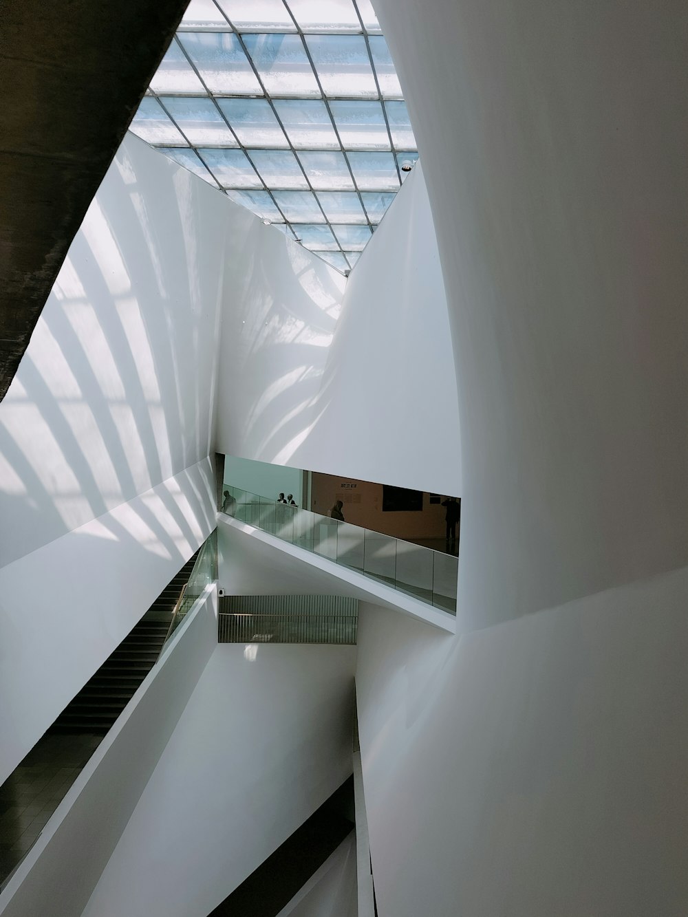 a view of a building from the top of a staircase