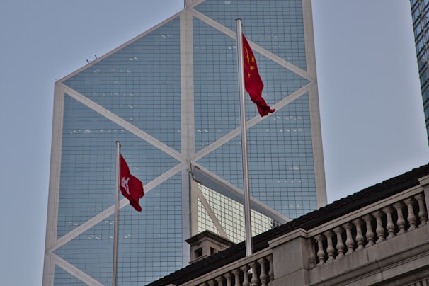A sleek modern office space with Moroccan and Chinese flags side by side, symbolizing partnership.