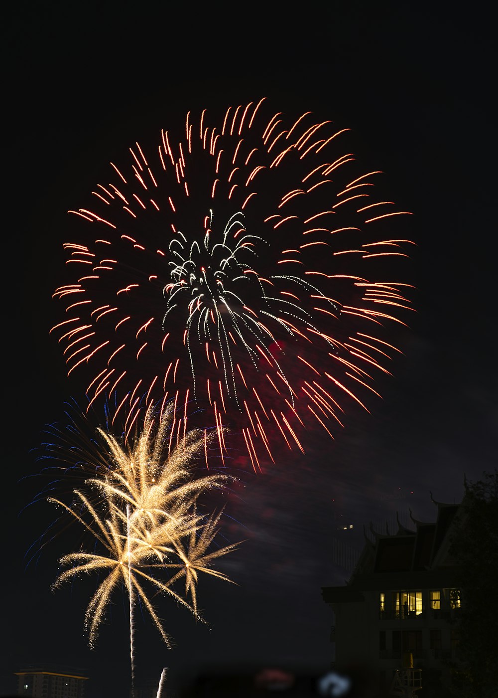 a large fireworks display in the night sky