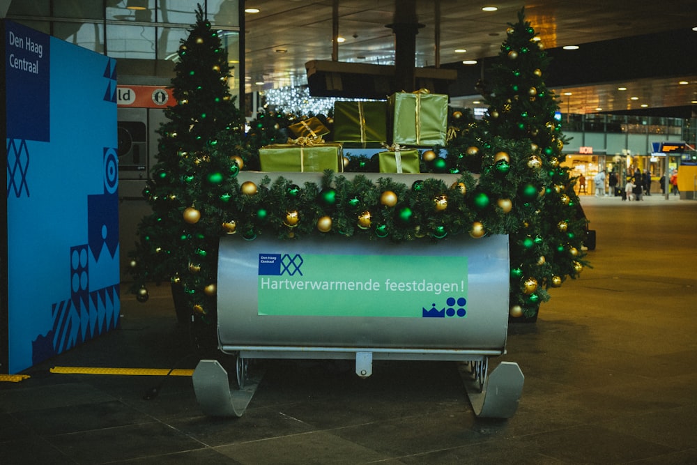 a christmas display in an airport terminal