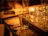 Elegant whiskey glasses set on a dark wood table with soft ambient lighting.