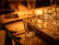 Elegant whiskey glasses set on a dark wood table with soft ambient lighting.