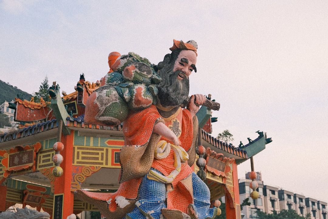 a statue of a man with a beard and a beard,