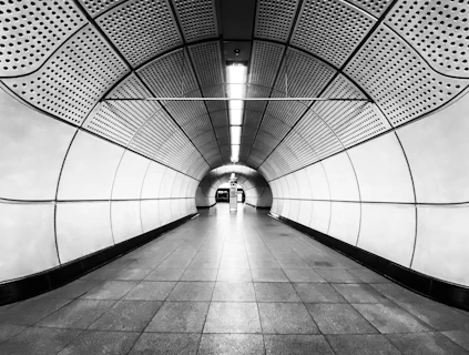a black and white photo of a tunnel
