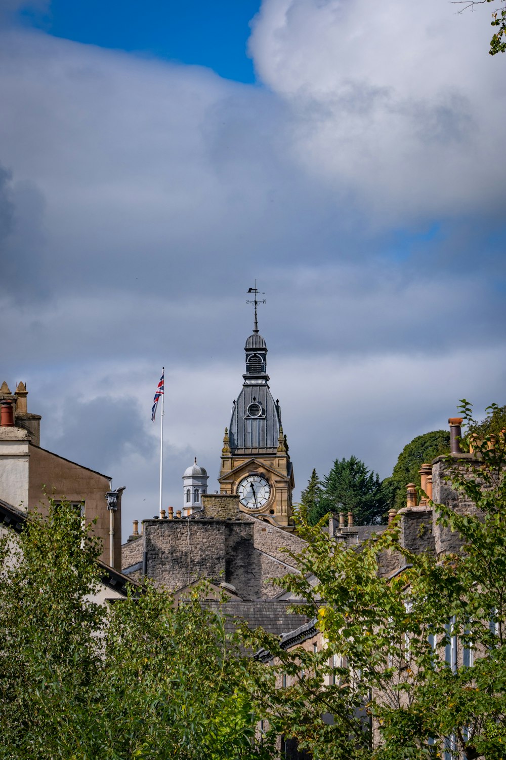 a tall clock tower towering over a city