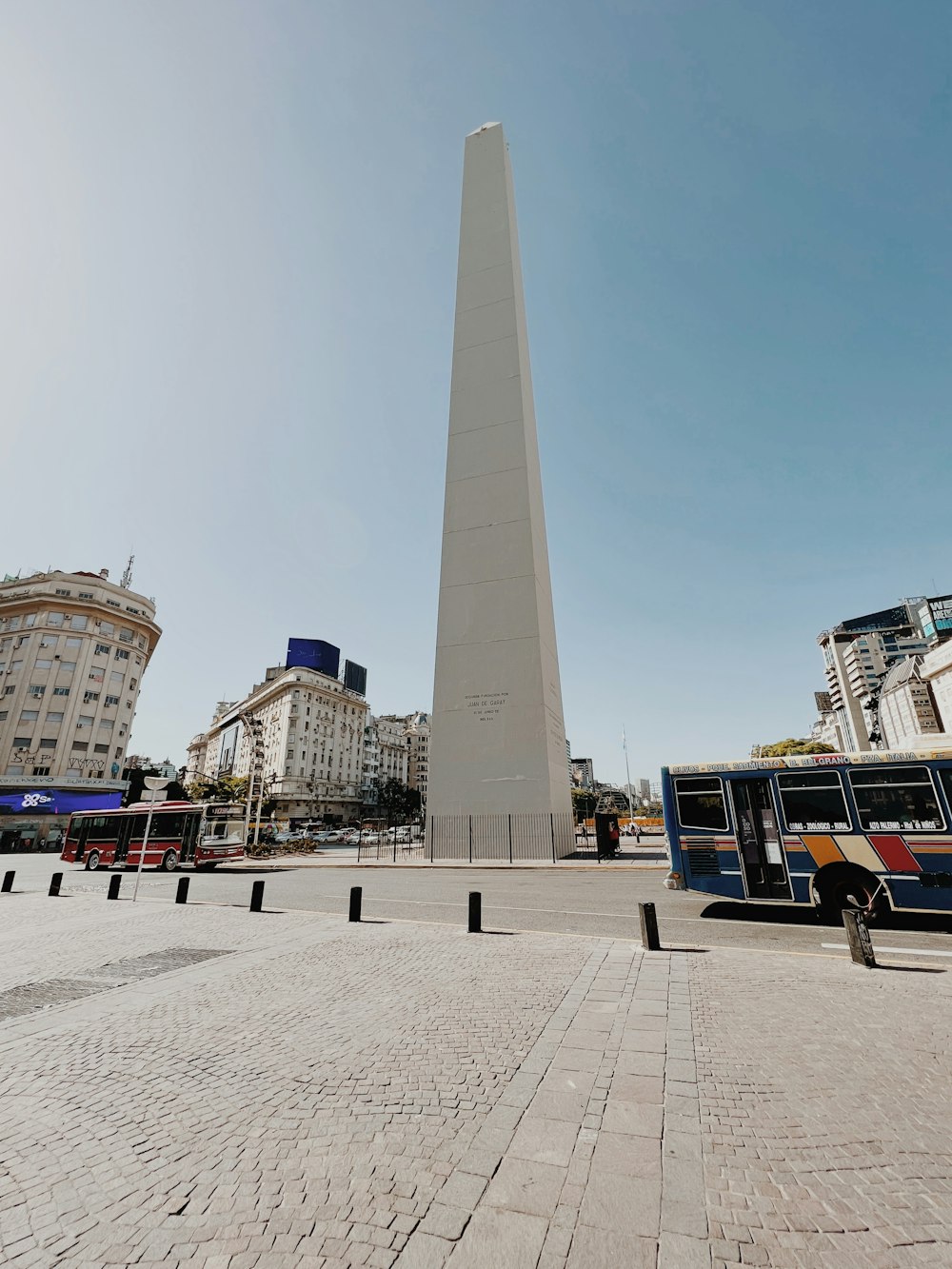 a very tall obelisk in the middle of a city