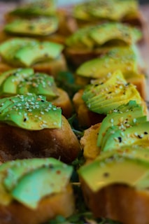 A close-up of sourdough bread with avocado cream.
