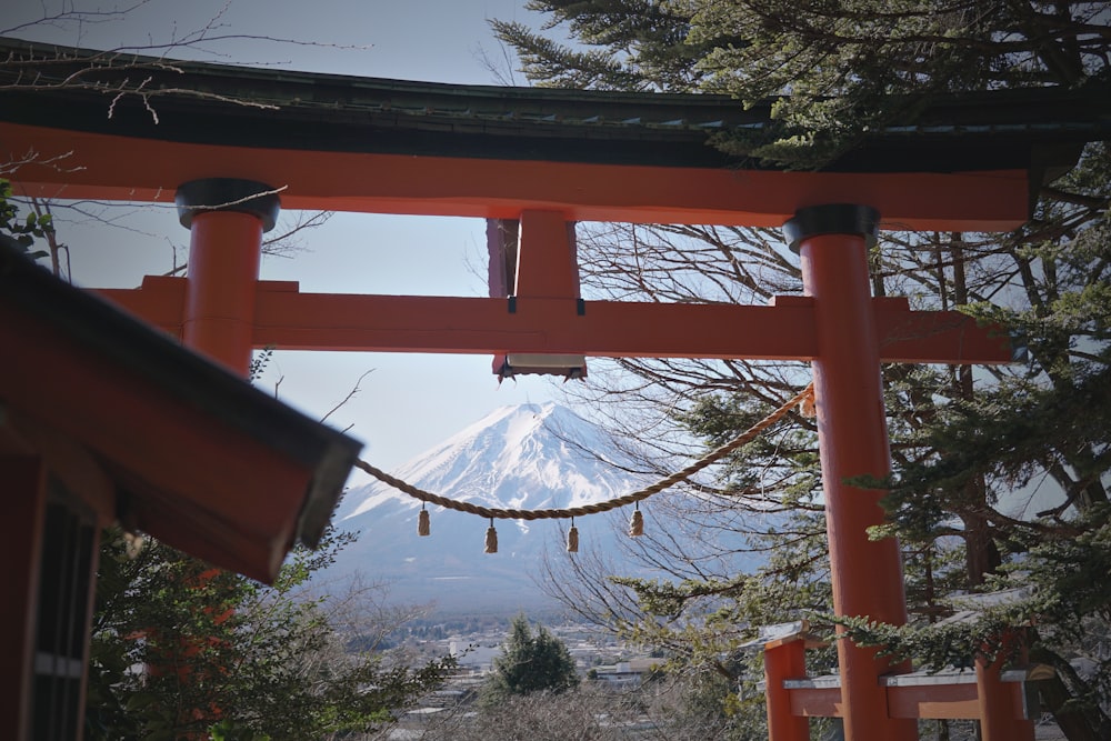 a view of a mountain through a gate