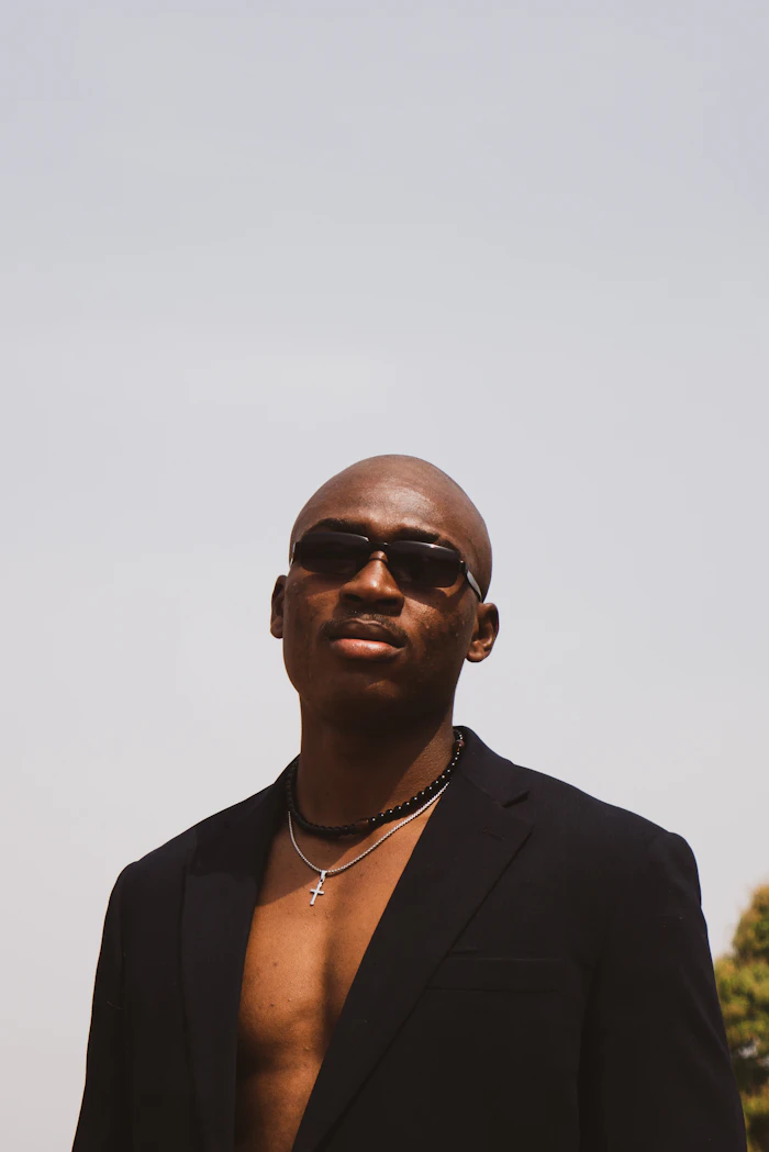 Professional VVIP protection officer in suit and sunglasses