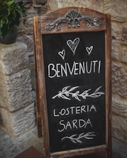 A welcoming Italian home with a Turkish family smiling in front.