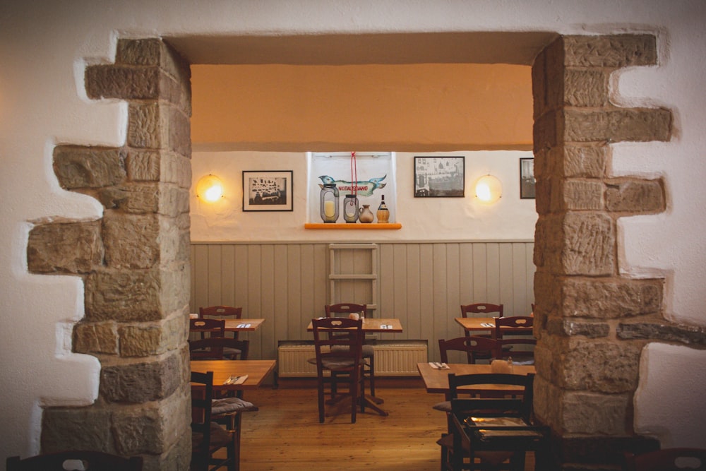 a view of a restaurant through an archway