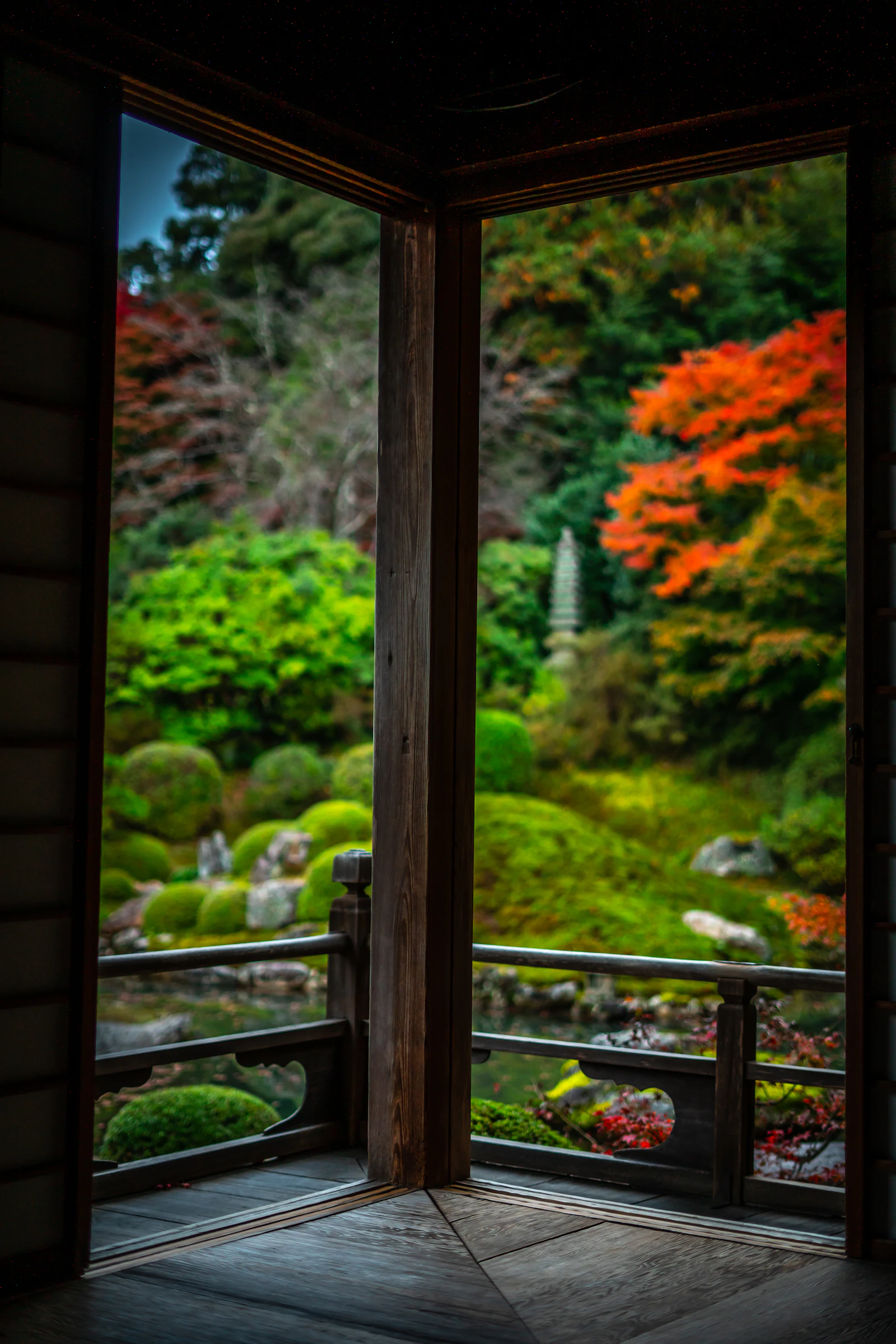 A tranquil tatami ryokan room looking out onto a private garden