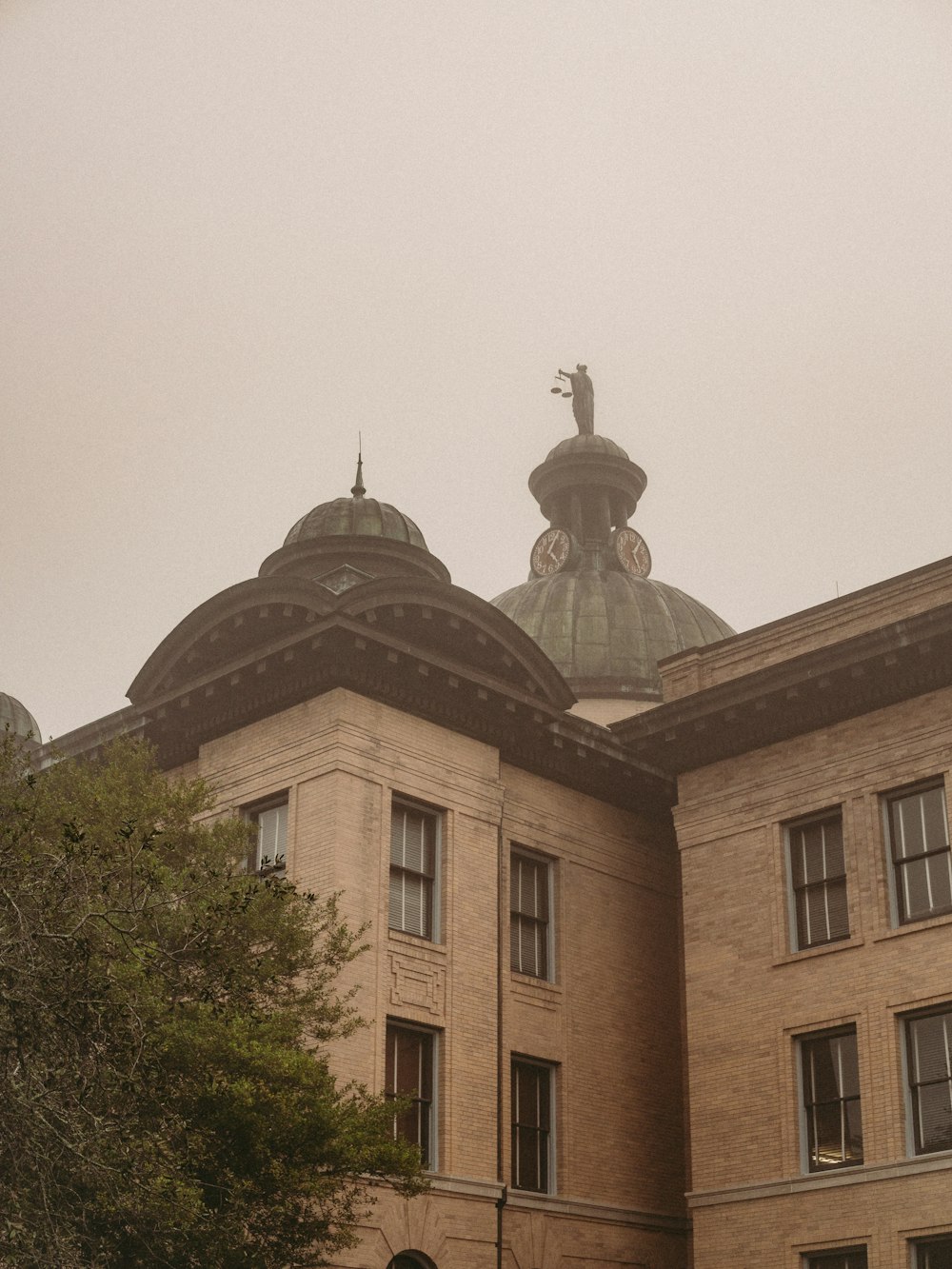 a large building with a clock on the top of it