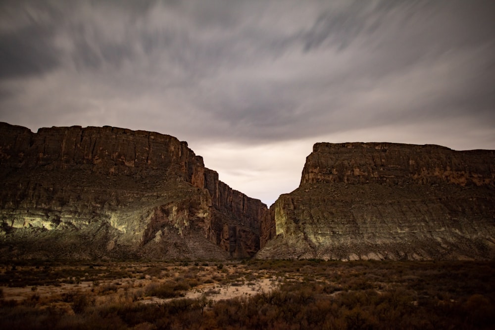 a mountain range with a river running through it