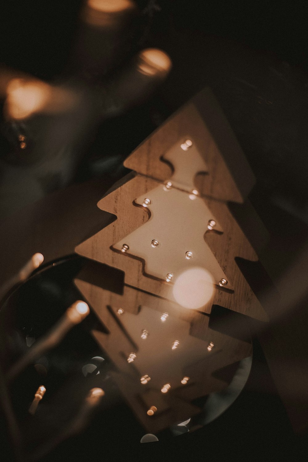 a close up of a christmas tree on a table