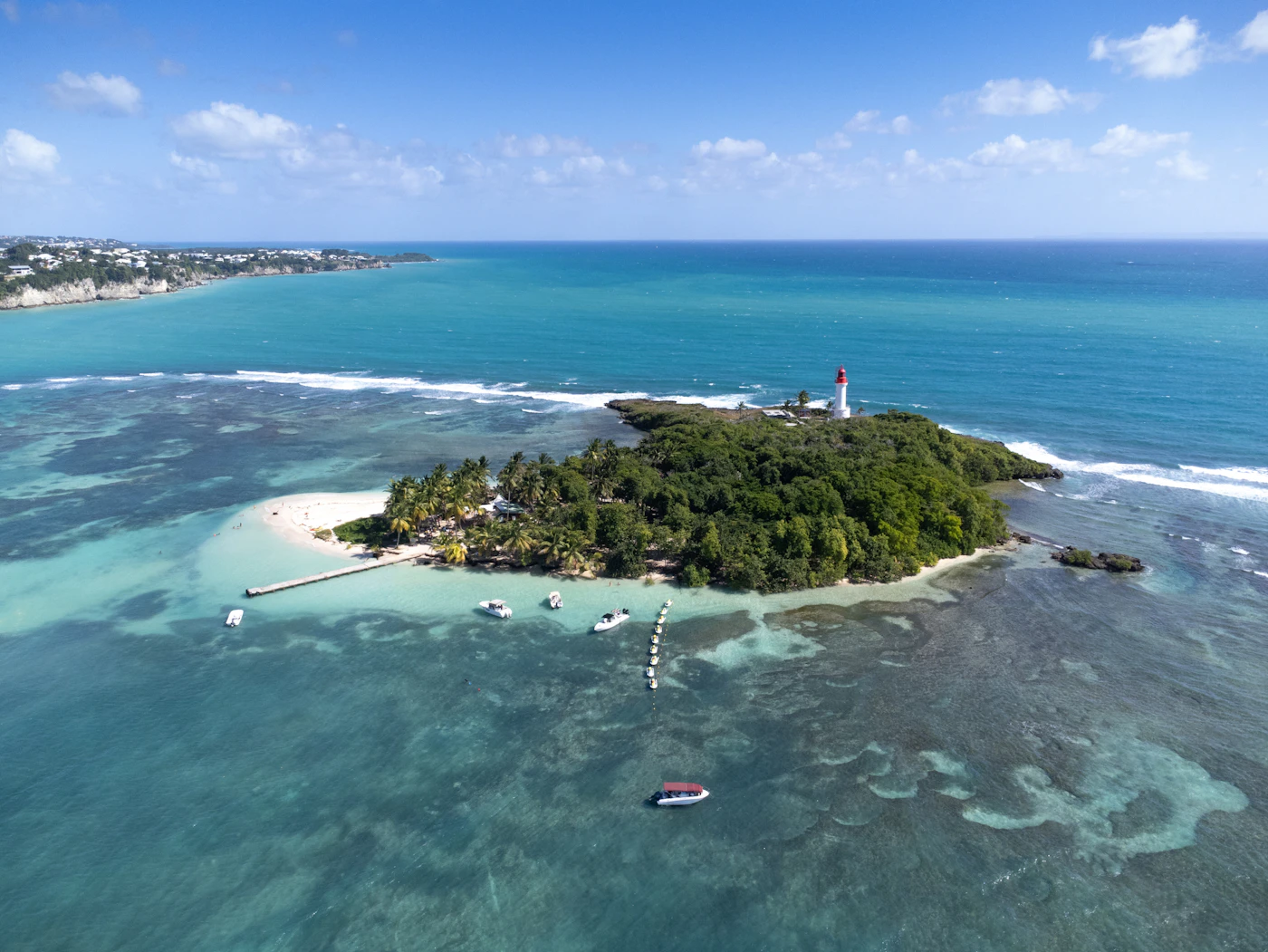 Landscape photo of Guadeloupe beach and tropical coastline.