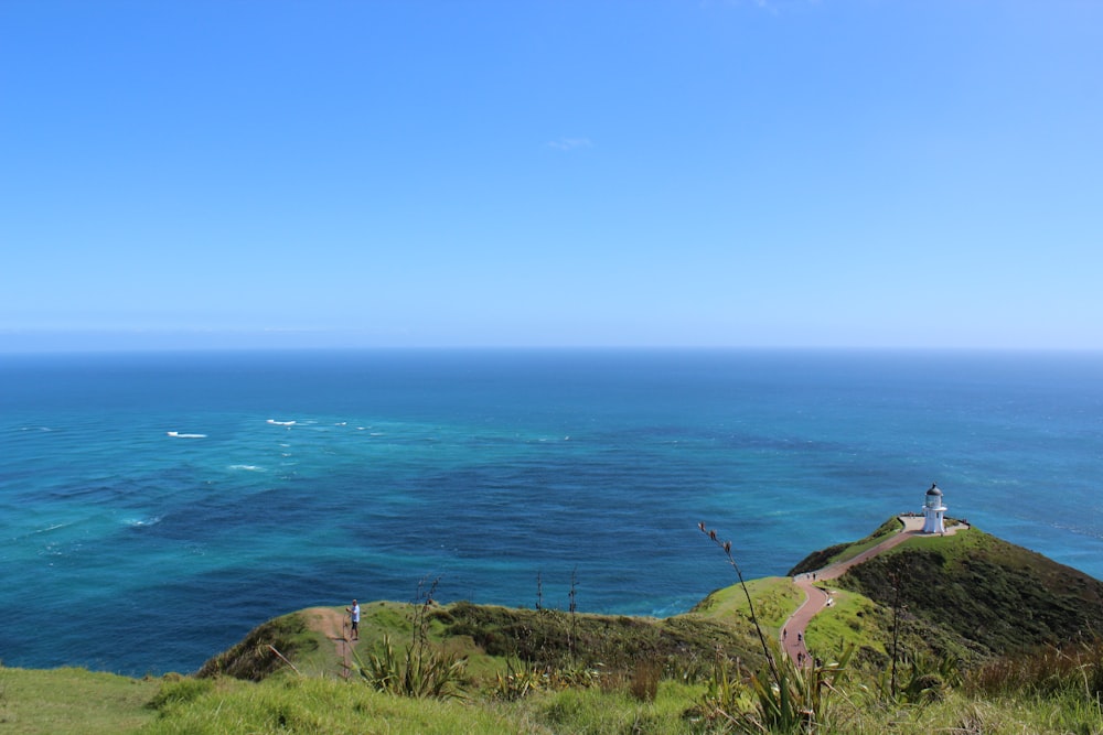 a scenic view of the ocean from a hill