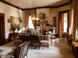 a living room filled with furniture and a fire place