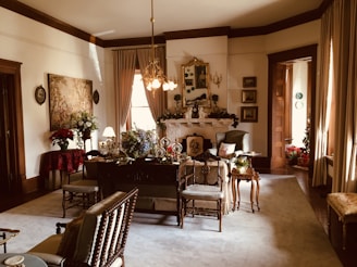 a living room filled with furniture and a fire place