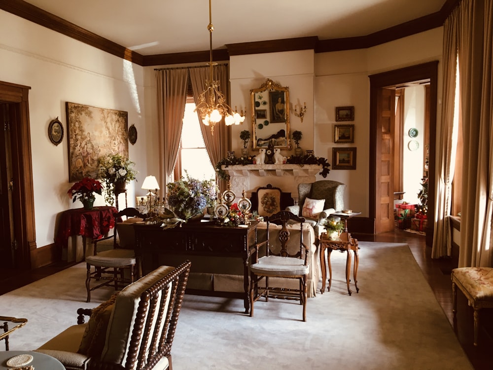 a living room filled with furniture and a fire place