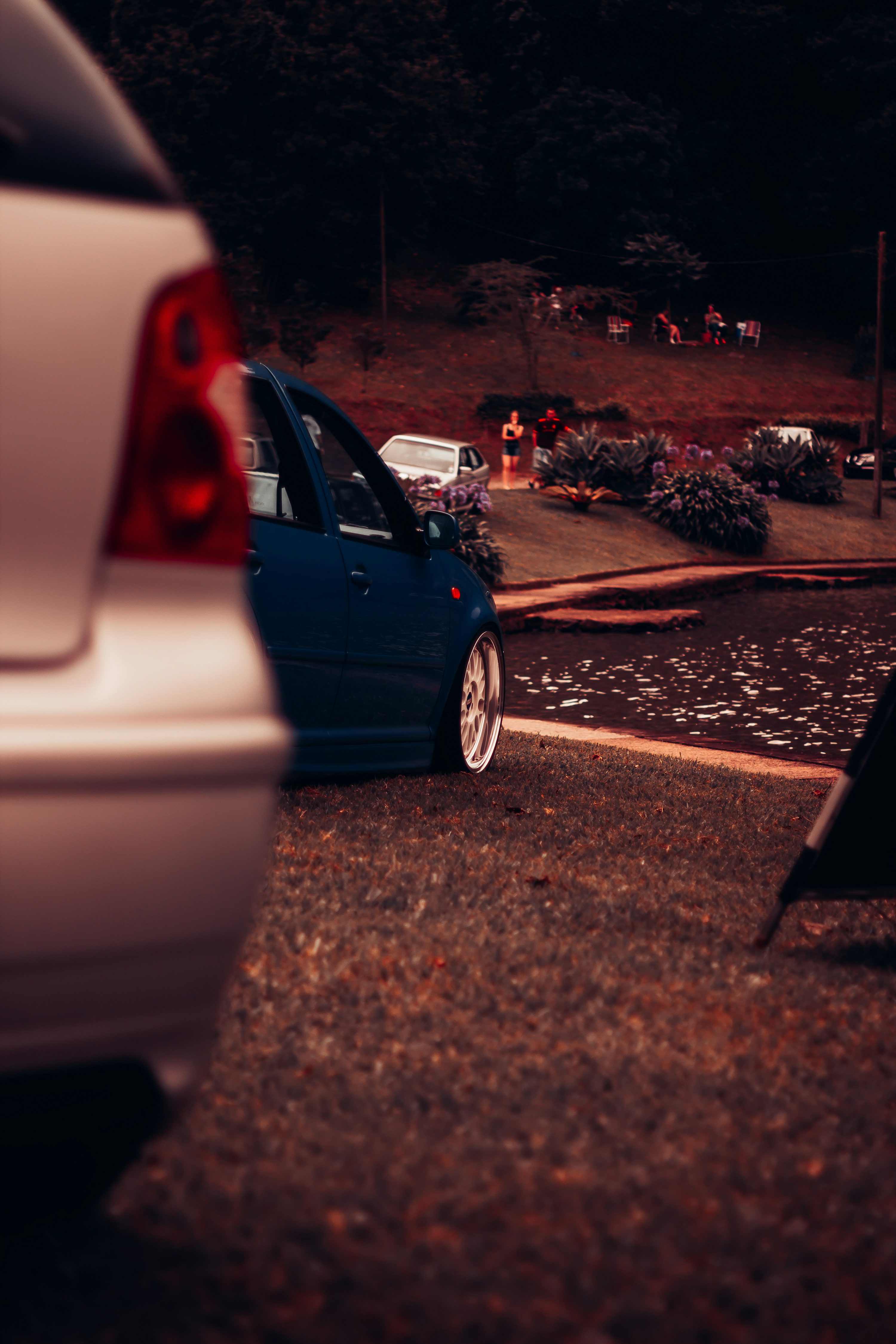 a white car parked in a parking lot