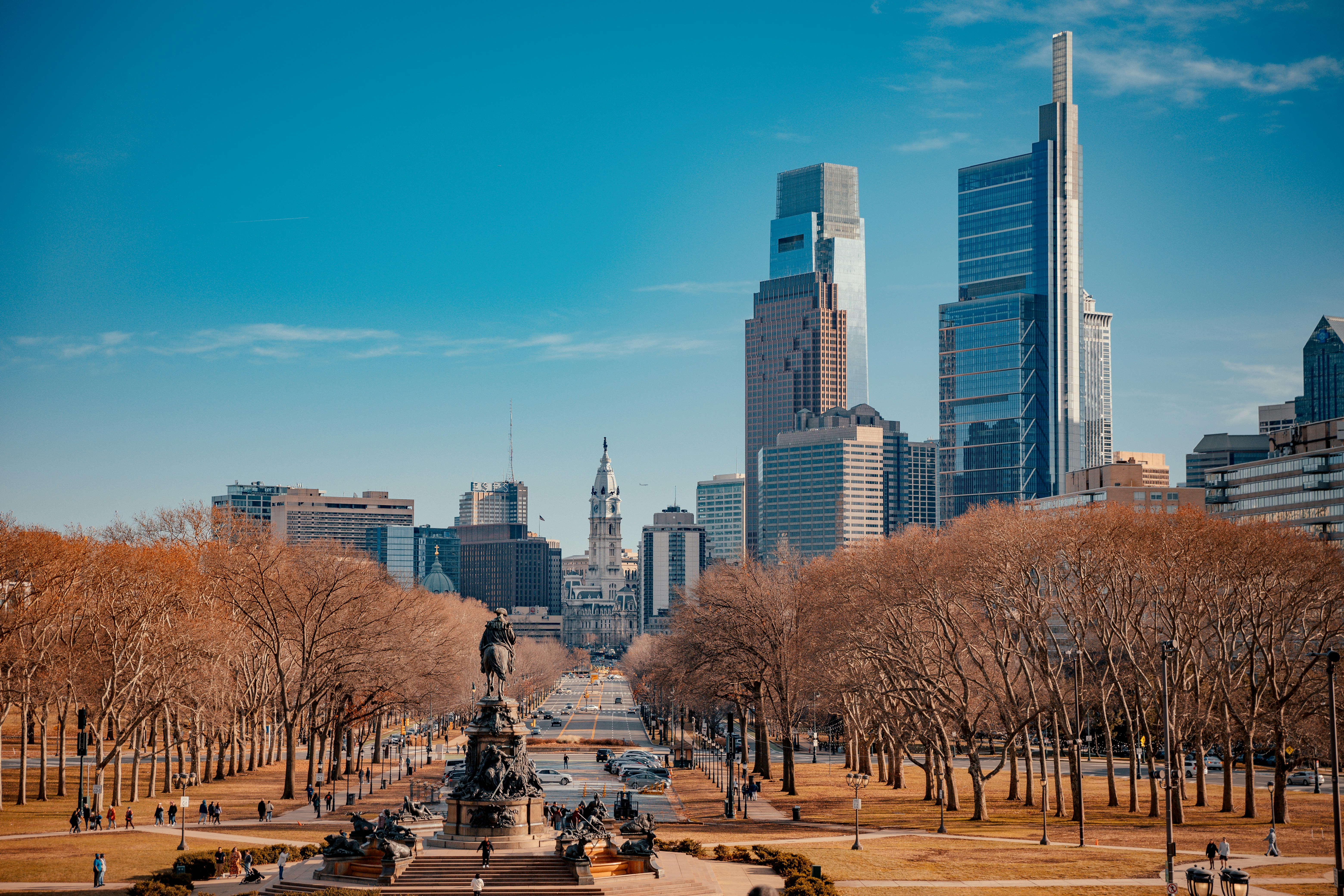 a view of a city with tall buildings in the background