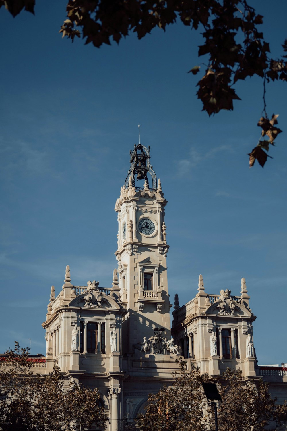 a tall building with a clock on the top of it