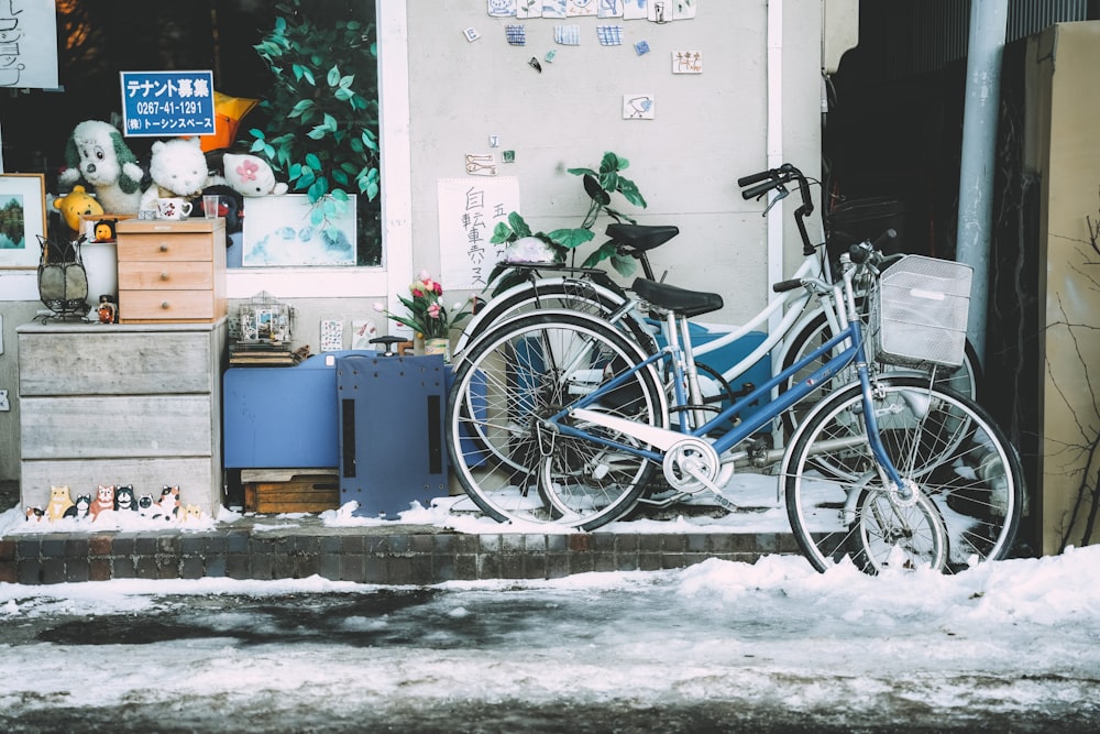 a couple of bikes that are sitting in the snow