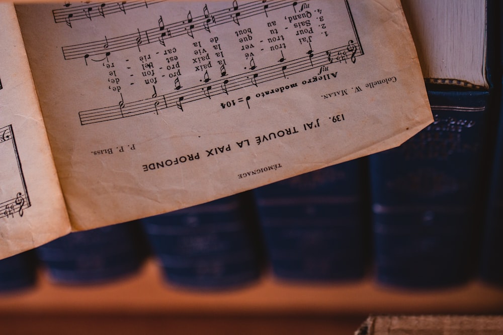 an old book with sheet music on it