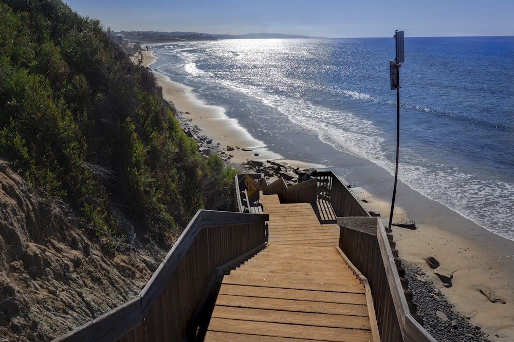 a set of stairs leading down to the beach