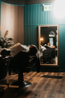 a person sitting in a chair in a room