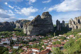 a view of a small village in the mountains