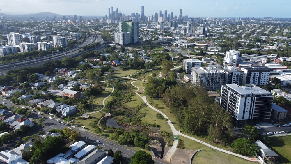 an aerial view of a city with lots of tall buildings