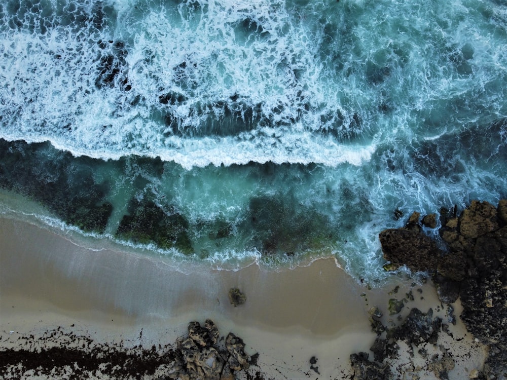 an aerial view of a beach and ocean