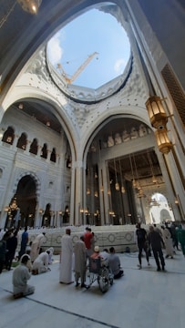 Group praying together inside a beautiful cathedral.