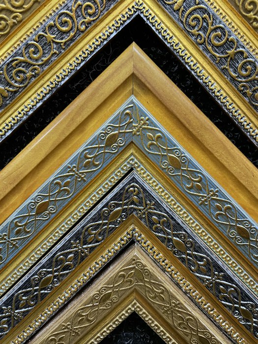 Detail of an ornate gold frame corner