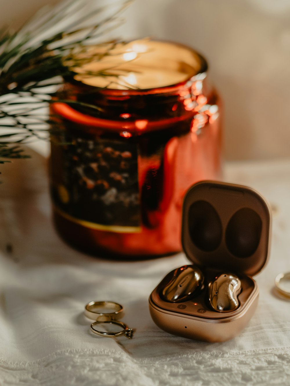 a couple of wedding rings sitting inside of a box