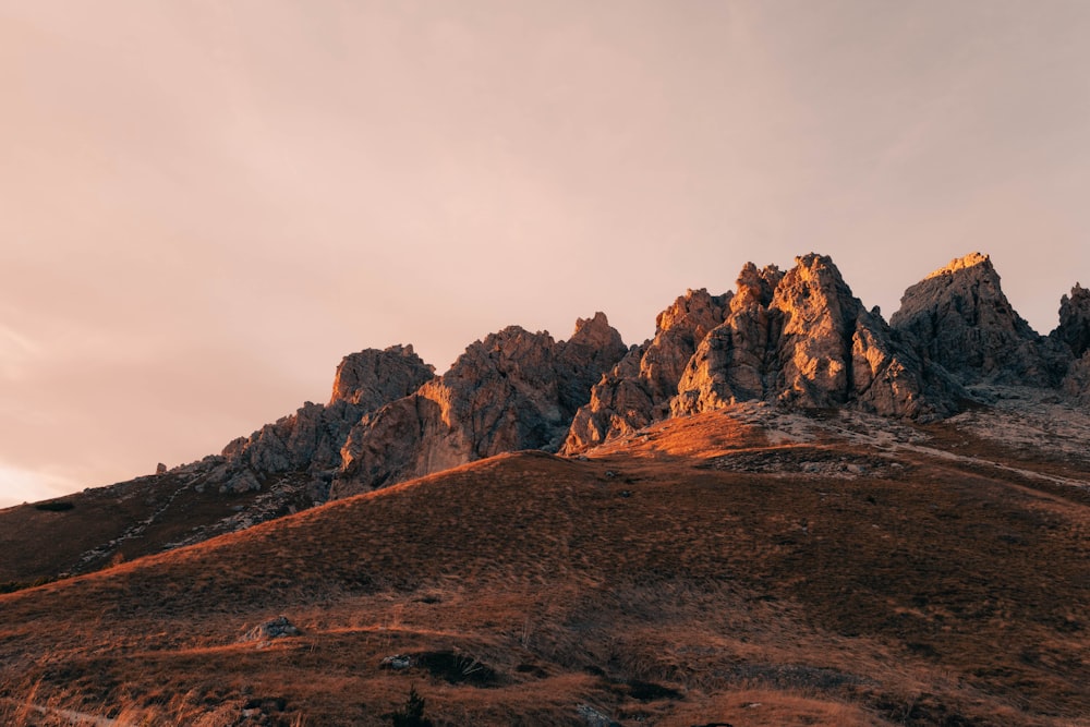 a mountain with a few rocks on top of it