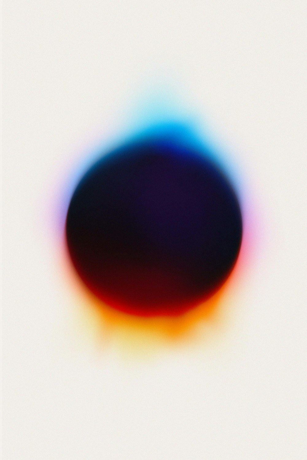 a blurry image of a blue and red object
