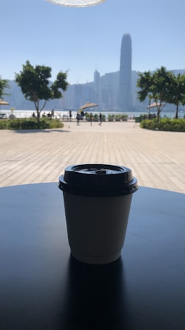 A vibrant Sydney cityscape with diverse influencers collaborating over coffee.