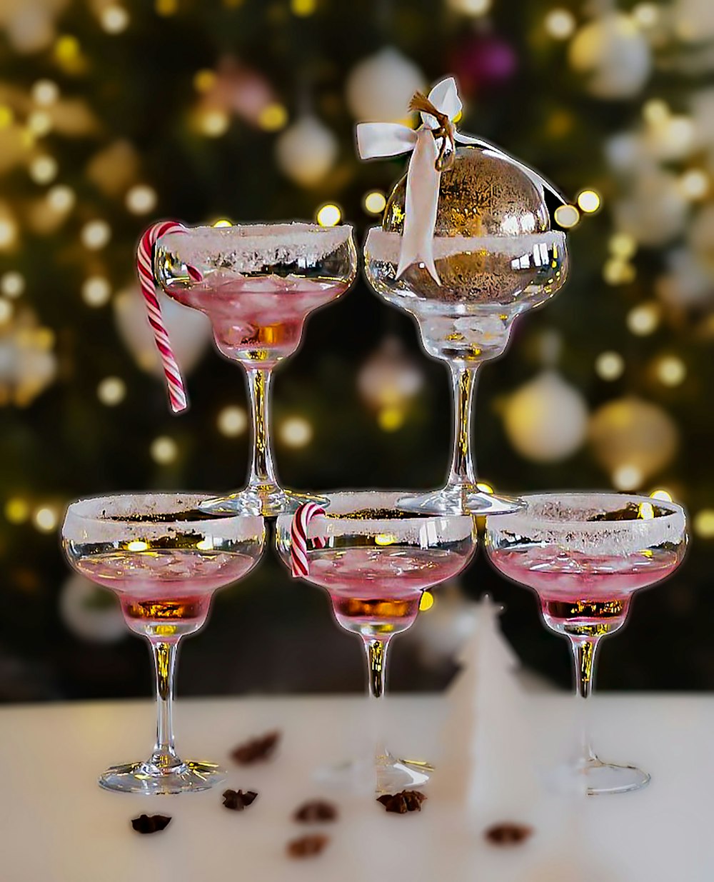 a group of wine glasses sitting on top of a table