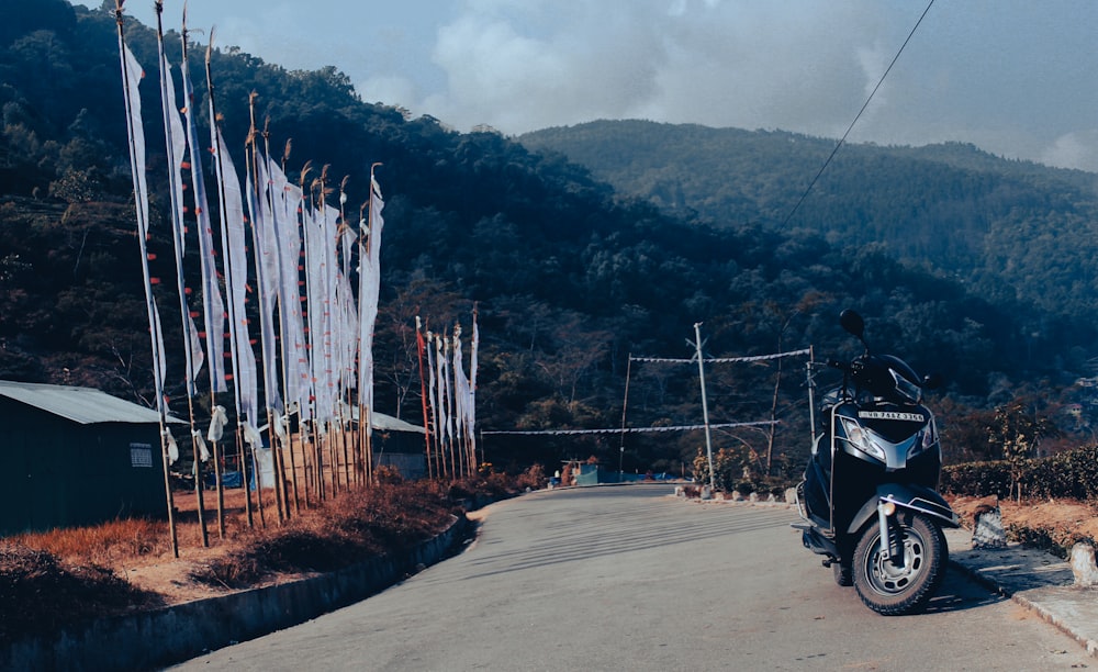 a motorcycle parked on the side of a road