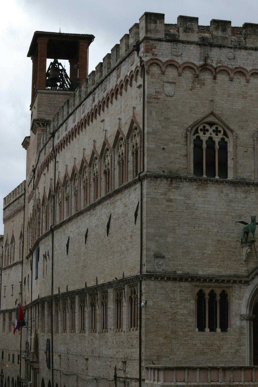 a tall building with a clock on the top of it