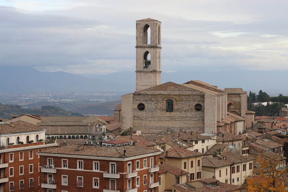 a view of a city with buildings and a clock tower