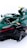 A green Formula 1 racing car with various sponsor logos including Aston Martin, Bombardier, JCB, Oakley, BWT, and SentinelOne. The car features intricate aerodynamic components and a sleek design. It has a single cockpit with a visible steering wheel and control mechanisms.