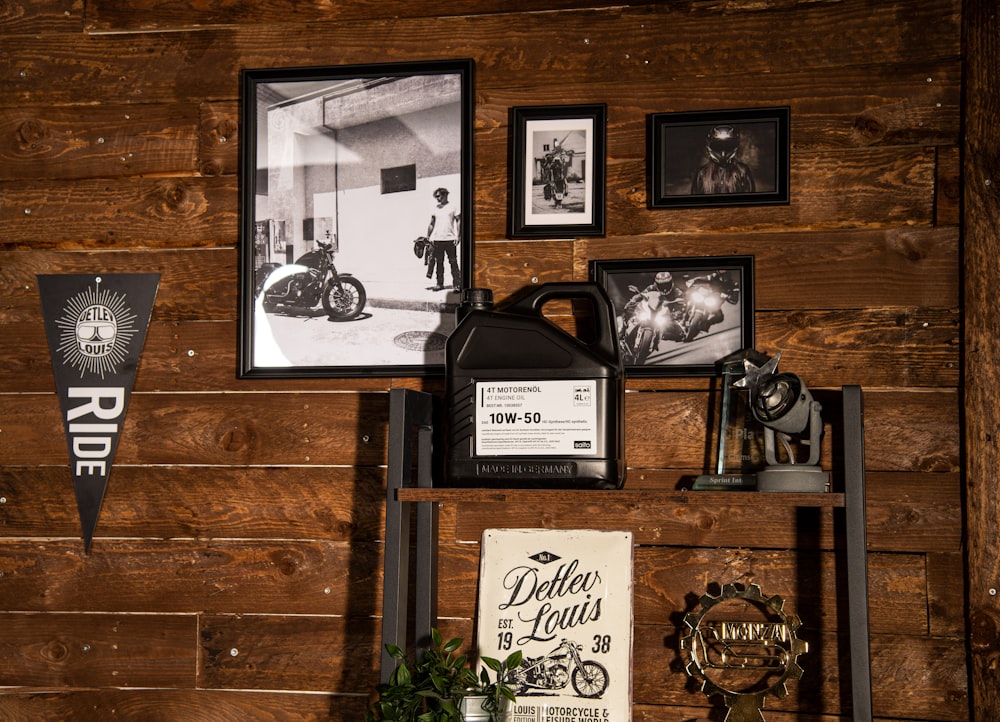 a wooden wall with pictures and pictures on it