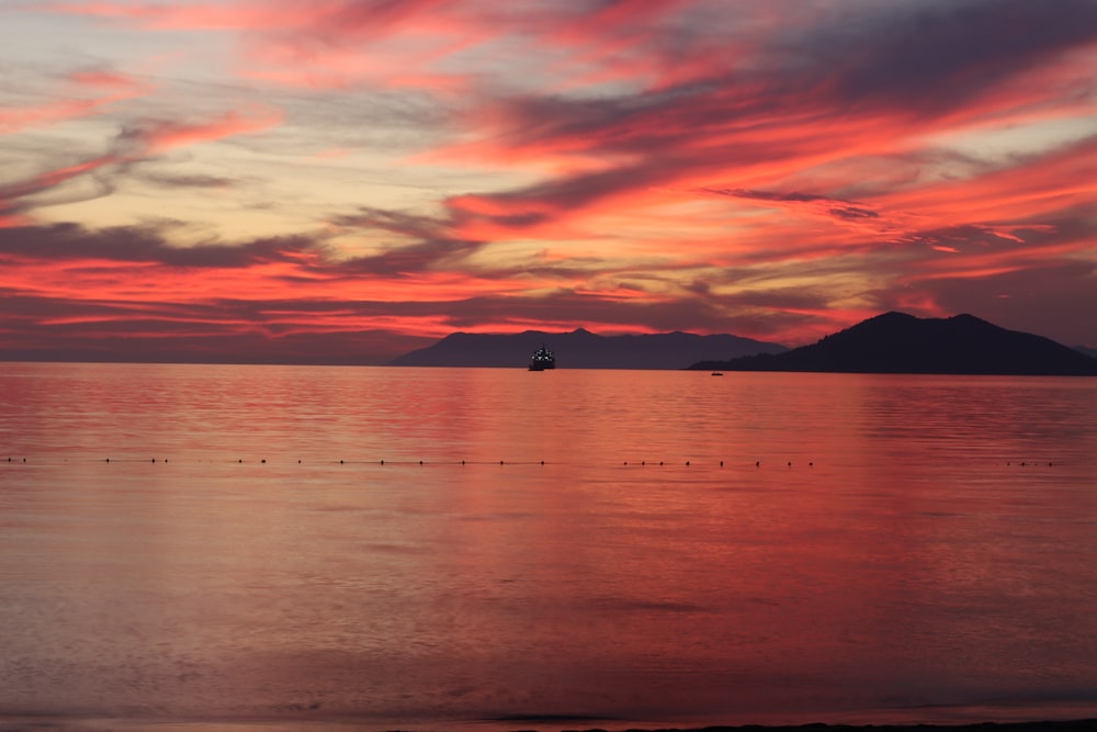 a beautiful sunset over a large body of water