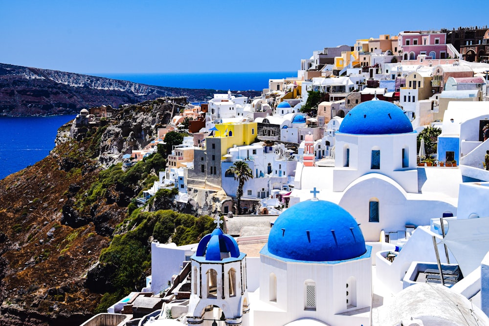 a scenic view of a blue and white village